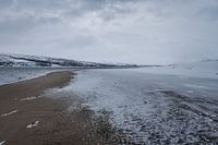 Sneeuwjachten over het strand