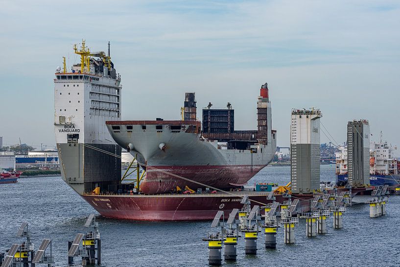 Boskalis Boka Vanguard with the Fremantle Highway. by Jaap van den Berg