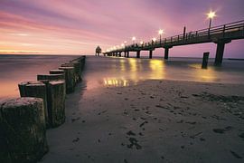 The Zingst pier, which extends into the sea and has a diving gondola at the end. by Martin Köbsch