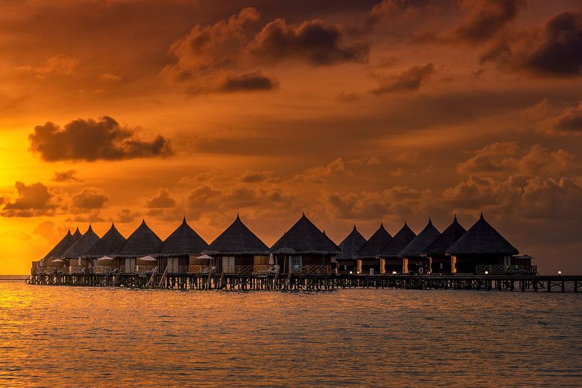 Bungalows in the Maldives by Markus Stauffer