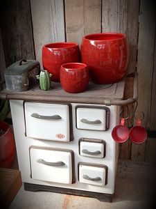 Old Stove With Red Pots