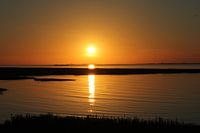 zonsondergang aan zee