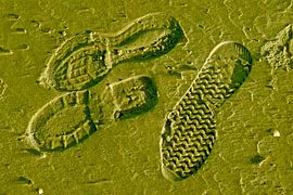 Empreintes de chaussures dans le sable à Langeoog sur Karl-Heinz Petersitzke