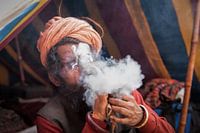 Smoking Sadhu during Kumbh Mela in Haridwar, India