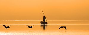Pêcheur au lever du soleil