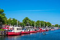 View of the Alter Strom with fishing boat in Warnemünde by Rico Ködder thumbnail