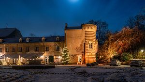 Elsloo in de avond in de winter met sneeuw