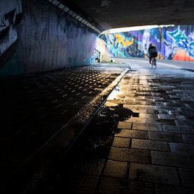 Tunnel with graffiti and cyclist Berenkuil Eindhoven by Ger Beekes
