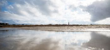 Flaque d'eau sur la plage