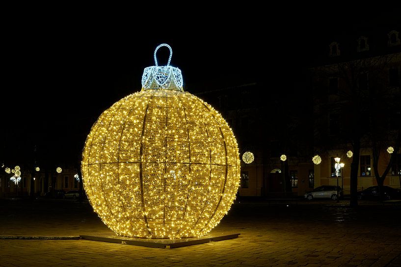 Christmas tree ball on the cathedral square in Magdeburg by Heiko Kueverling