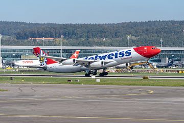 An Airbus A340-300 of Switzerland's Edelweiss takes off from Zurich airport. by Jaap van den Berg