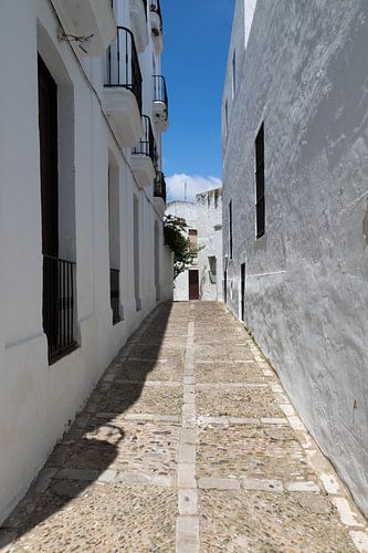 Small street in a white village in Spain.