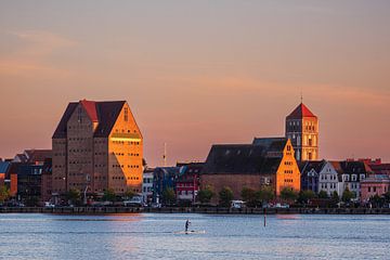 View over the Warnow to the Hanseatic City of Rostock in the evening