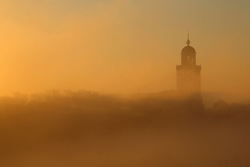 Tower of Lebuïnus Church Deventer in the mist by Ronald Pol