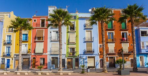 Colorful houses and palm trees in Villajoyosa
