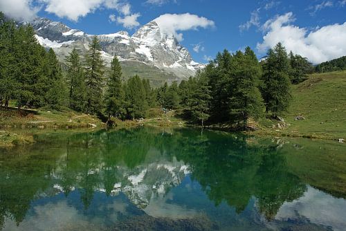 Lago Blu in the Aosta valley with the Matterhorn on the background. by Gert van Santen