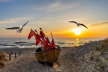 Sunset on the beach on Usedom with fishing boat by Animaflora PicsStock
