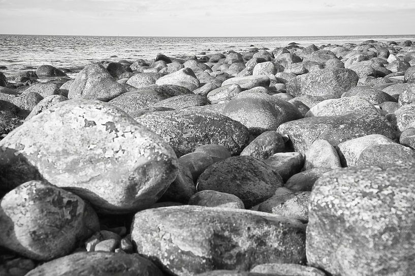Stone beach in Denmark by the sea by Martin Köbsch