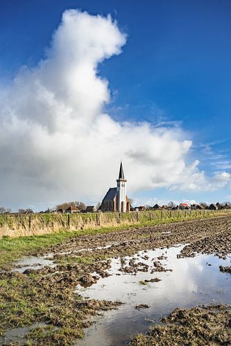 Typical white church in landscape at the island, Texel, Holland
