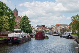 Boats in city canal in Zwolle by Peter Apers
