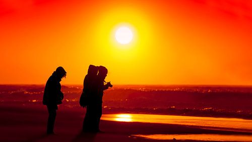 Stormy sunset on the beach of Scheveningen by Rob Kints