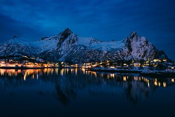 Svolvaer nIghttime view over the illuminated houses and snowy mountain by Sjoerd van der Wal Photography