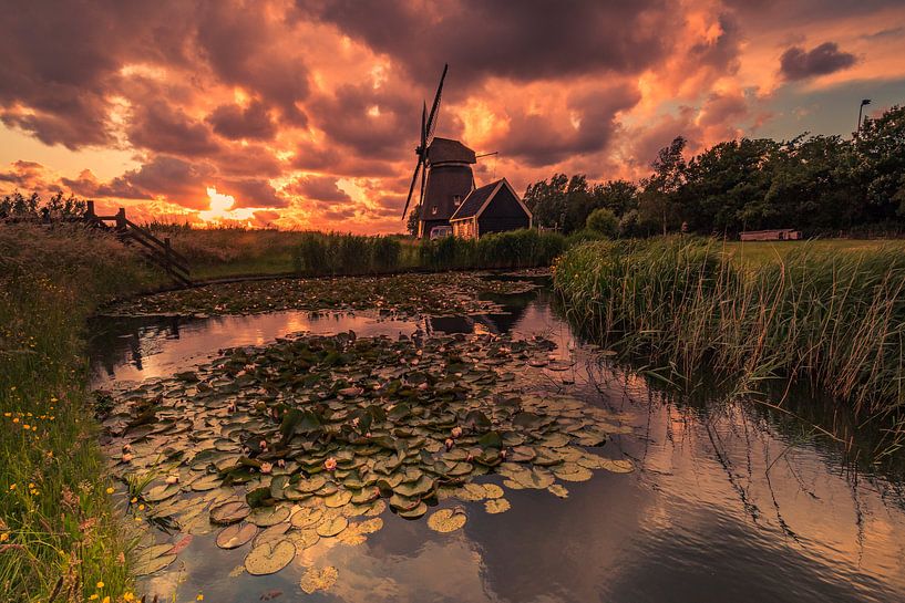 Sunset behind the mill by peterheinspictures