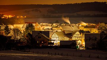 Winternacht in Herleshausen van Roland Brack