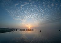 Sonnenaufgang mit Reflexion auf dem Wasser