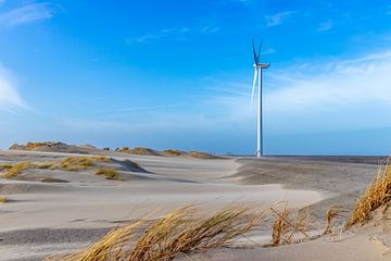 Windmill or wind turbine during a February storm on work island Neeltje Jans in Zeeland.