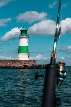 Lighthouse with fishing rod by Sophie Luther