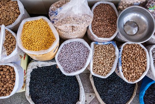 Noix et haricots sur Alex Neumayer