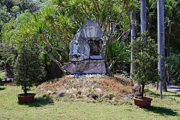 Buddha carved in sacred stone by Frank Photos