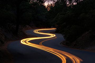 Winding road with light trails by Poster Art Shop