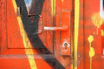 Graffiti, colourfully painted garage door with door handle