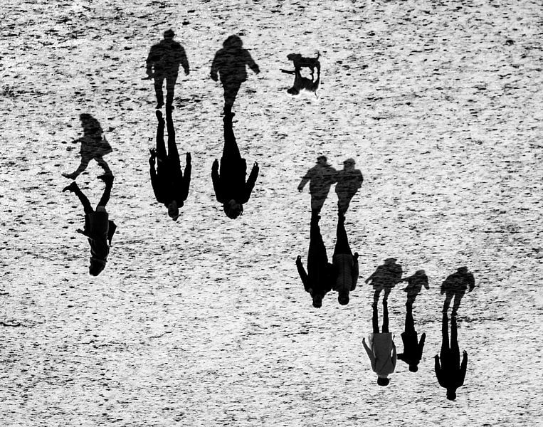 Shadow play on the beach by Emil Golshani