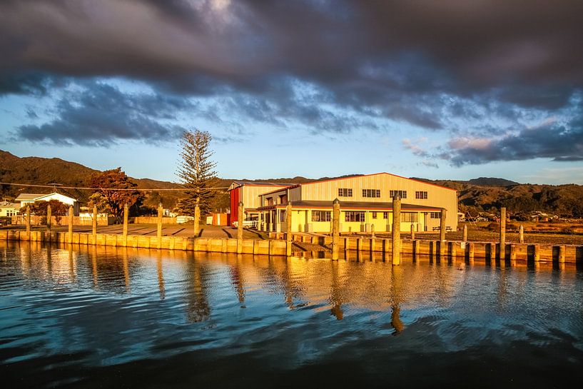 Harbour facilities in Coromandel in the evening light, New Zealand by Christian Müringer