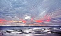 cloudy sunset on beach mixed media