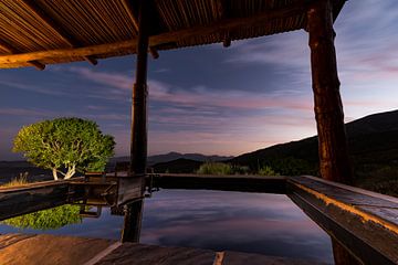 Night falling over South-African mountain lodge by Andreas Jansen