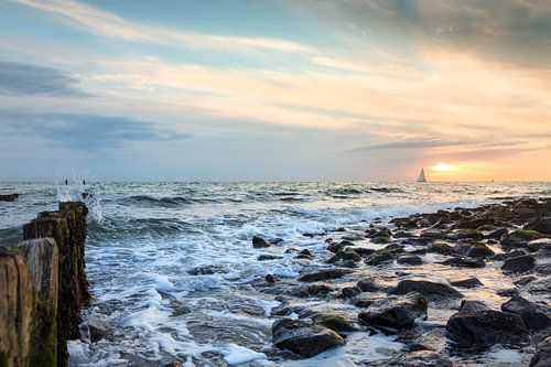 Zonsondergang aan zee