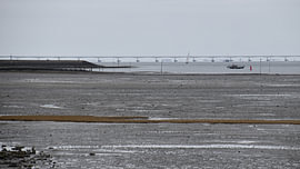 Slik near Kattendijke and the Zeeland Bridge by Erik Buitenhuis