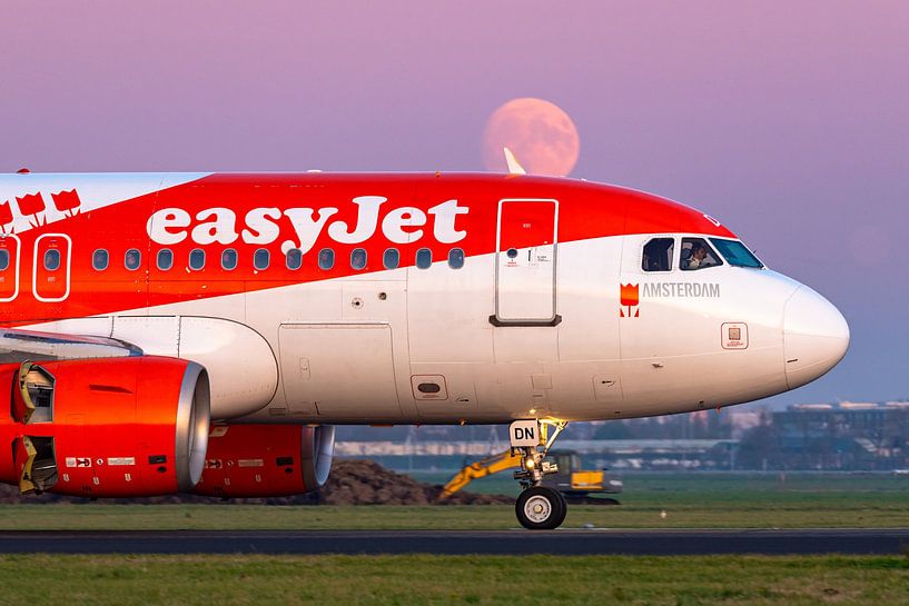 Easyjet amsterdam landing polder runway with moon by Arthur Bruinen