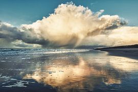 cloudburst over beach and dune by eric van der eijk