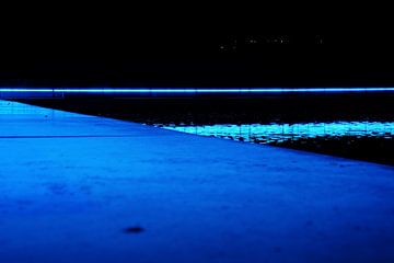 Abstract light falling on the ground & in the water