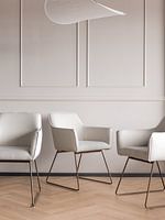 The three white chairs