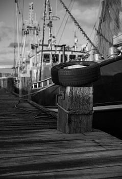 Rustic Harbour: Life at the Quay in Black and White