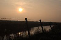 zonsondergang in de polder