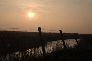 zonsondergang in de polder van Jean Jacobs