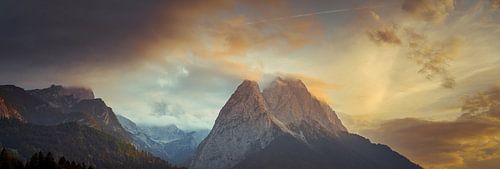 Mountain landscape in the evening light with dramatic sky