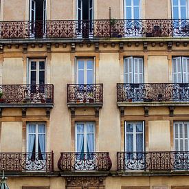 Facade with wrought-iron balconies by Blond Beeld